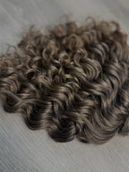 Natural brunette 9” curly